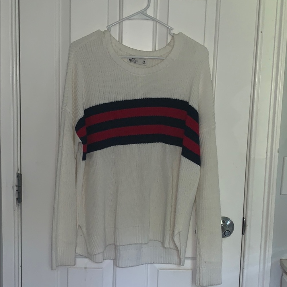 Cream sweater with navy blue and red strip